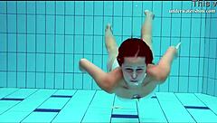 oh wow, nata the hot hungarian babe is swimming in the pool! is she horny in that huge bikini?