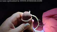 Intriguing slave cums on command, showing off his cock for your pleasure in this fetish scene.