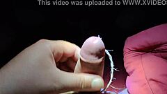 Intriguing slave cums on command, showing off his cock for your pleasure in this fetish scene.