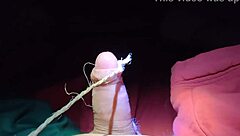 Intriguing slave cums on command, showing off his cock for your pleasure in this fetish scene.