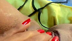 The fat slut gets fingered to orgasm in public outdoor scene