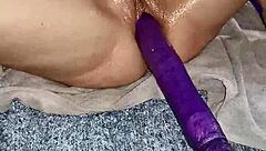 Velvet Rain Squirting with Huge Toy While Watching Porn