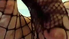 Brunette's feet get covered in cum