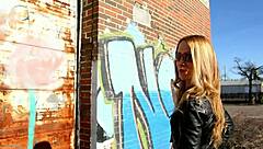 Blonde Posing in Black Leather Pants Leather Jacket and High Heels