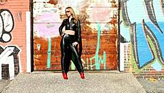 Blonde Posing in Black Leather Pants Leather Jacket and High Heels