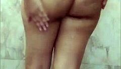 Indian girl masturbates in the bathroom, natural tits and big ass on display