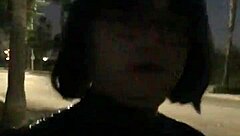 Crossdresser walks in latex and uses sex toy in public