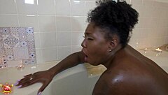 Giana soaks her pretty pussy while stroking.