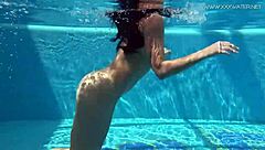 Jessica lincoln, the small tatted russian teen 18+, bathes naked in the pool