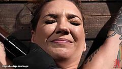 Tattooed Busty Slave Bound and Fucked with Dildo