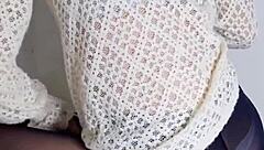 Is this brunette getting wet while preparing for work?