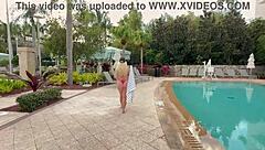 hot milf shows wet shaved pussy in public tub