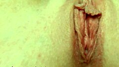Intense close-up of a girl pleasuring herself to a strong orgasm