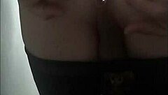 A tantalizing crossdresser indulges in self-pleasure with hidden anal toys