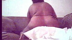 A 40-year-old Guyanese woman with large breasts gets penetrated by a man with a big cock