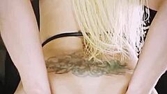 blonde plays with anal plug then fists herself