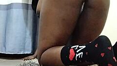 watch this ebony babe finger her ass till she squirts and orgasms