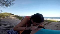 African beauty fucks publicly on beach for car help