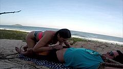 African beauty fucks publicly on beach for car help