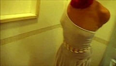 Golden goddess enjoys BDSM bathroom play