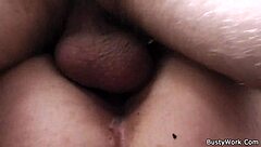 A busty blonde office worker engages in oral and vaginal sex at her workplace