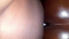 Oiling and massaging the back of a voluptuous woman