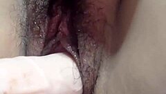 Playing with dildo for anal fun