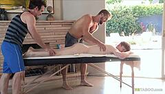 Muscular hunk gets a dual massage and cock stroke satisfaction