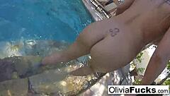 Olivia, the milf pornstar, masturbates nude in the pool