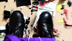 Exotic pornstar crushes big cars with boots in garage.