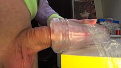 Explosive cumshot floods tight rubber vagina with monster cock action.