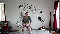 mature wife teaches yoga lesson with instructions