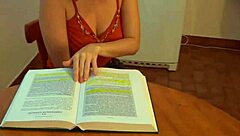 redhead babe with glasses masturbates close up while studying