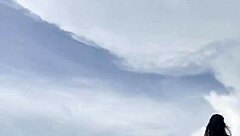 Sexy ladyboy stroking hard at white sand beach