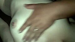 my breasts harden as he massages me to climax