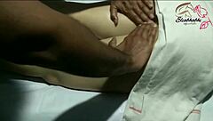 indian lady receives full body massage close up