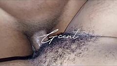 Close-up of passionate hairy pussy dripping with black cock