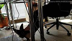 In the bustling office, a playful shoeplay moment captures attention