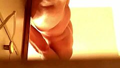 Spying girlfriend catches him jacking off