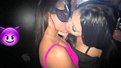 Two young girls licking on swing