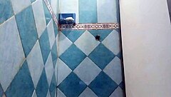 Pregnant Mexican Filipina woman showers after beach in voyeur video