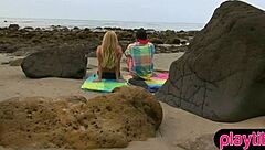 Blonde bombshell enjoys doggystyle on the rocky beach