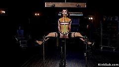 Submissive Brunette Tied in Plastic Corset Bondage