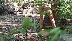 Two hot babes in the woods getting naked and having fun
