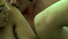 The tattooed girlfriend passionately fucks and sucks her boyfriend's cock in an erotic scene