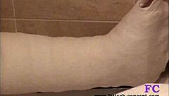 Teen amateur masturbates in shower with leg cast, feeling pain and pleasure