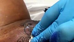 passionate tattoo session turns hardcore lesbian