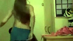 I watch this teen blonde rip her clothes off in a hot striptease on webcam.