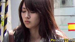 Secretly filming Asian girls urinating in public