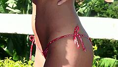 Can This Sexy Brunette Resist Masturbating in a Tropical Garden Setting?